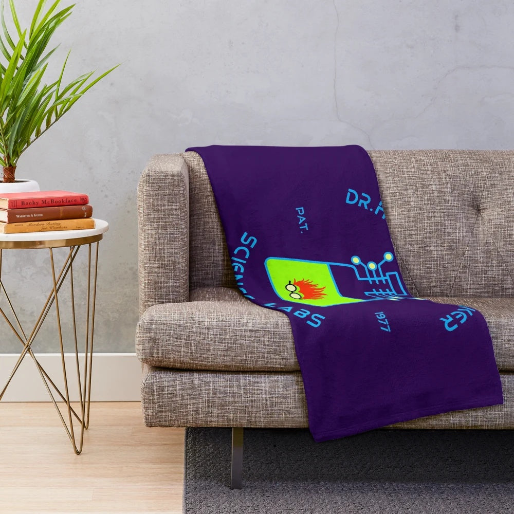 Retro science lab inspired plush blanket featuring Honeydew and Beaker characters