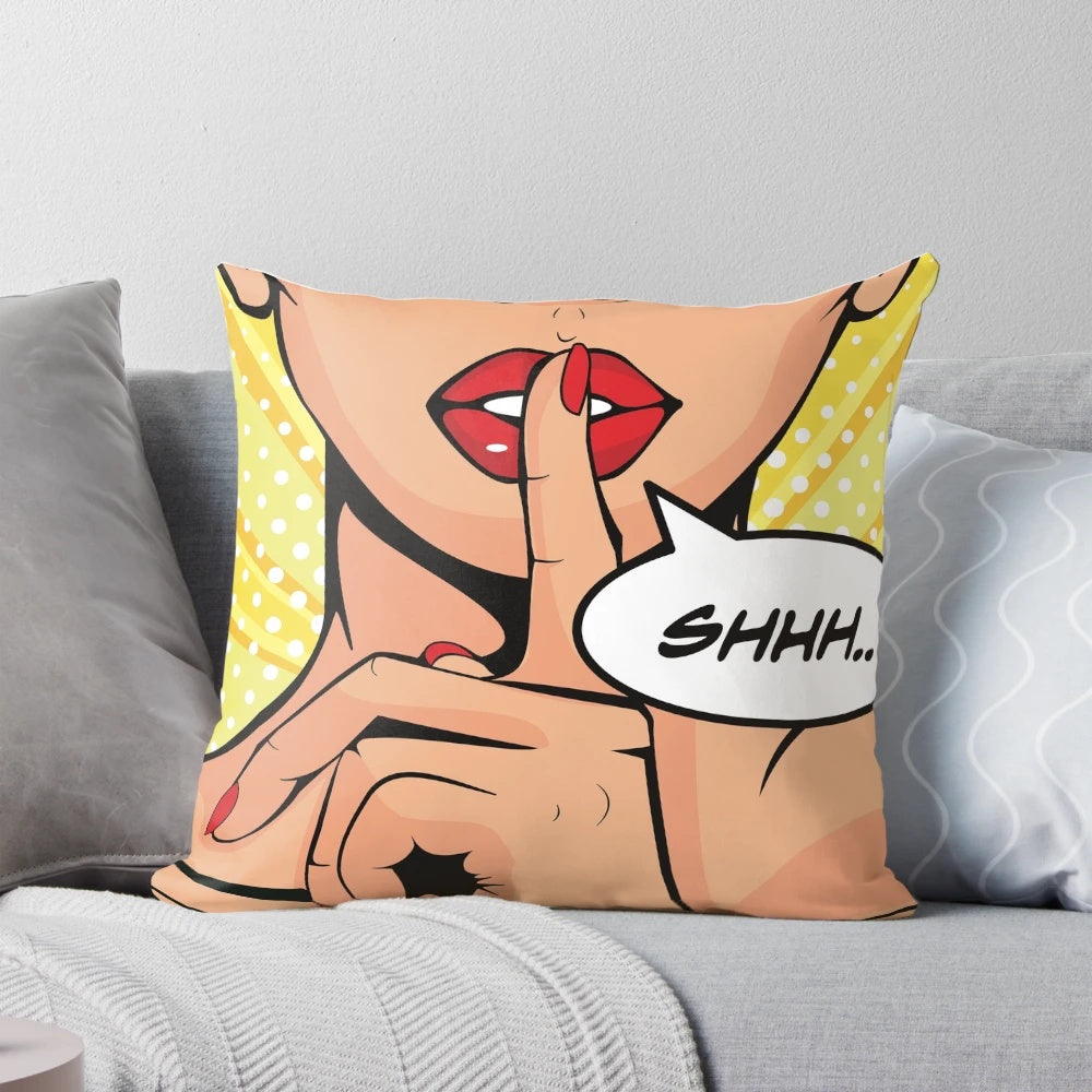 Vibrant pop art "Shhh" pillow in a retro comic strip style, featuring a woman with her finger to her lips against a colorful background.