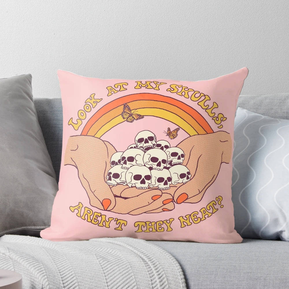 Colorful retro-style skull throw pillow with a pop art design