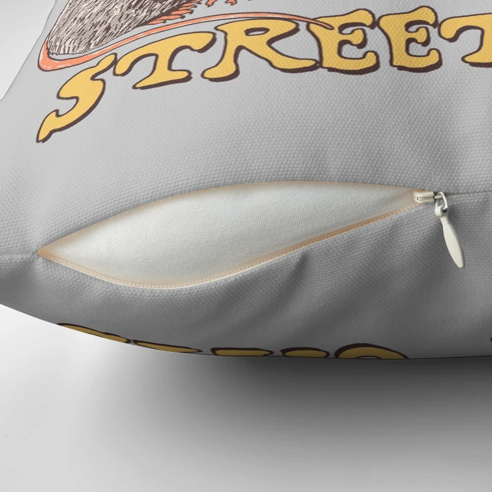 A colorful retro-style pillow featuring a design of street cats, possums, skunks, and raccoons in a vintage 80s style.