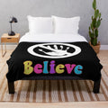 Colorful 80s-inspired plush blanket with a retro-style design