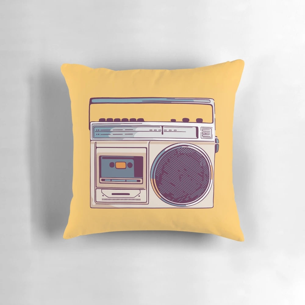 Vibrant yellow pillow with a retro-style boombox graphic, perfect for adding a touch of 80s nostalgia to any room.