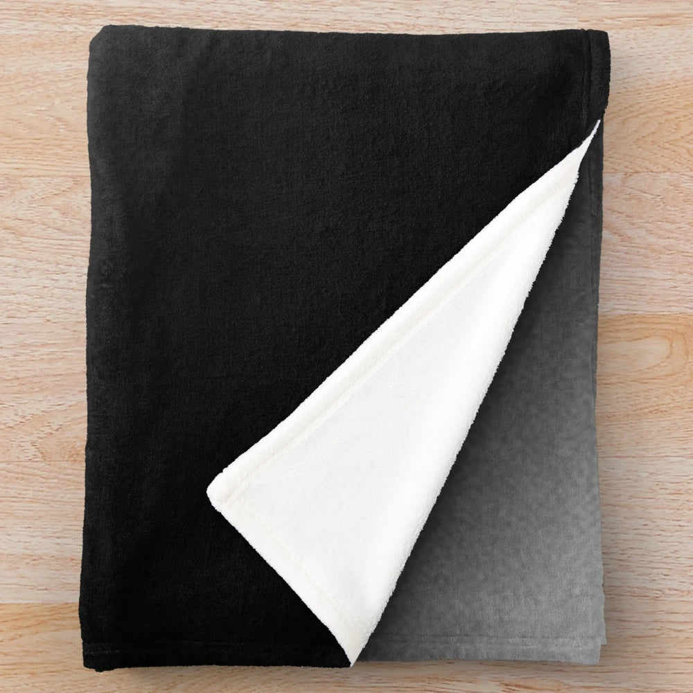 Retro-style plush blanket with music and karate-inspired design