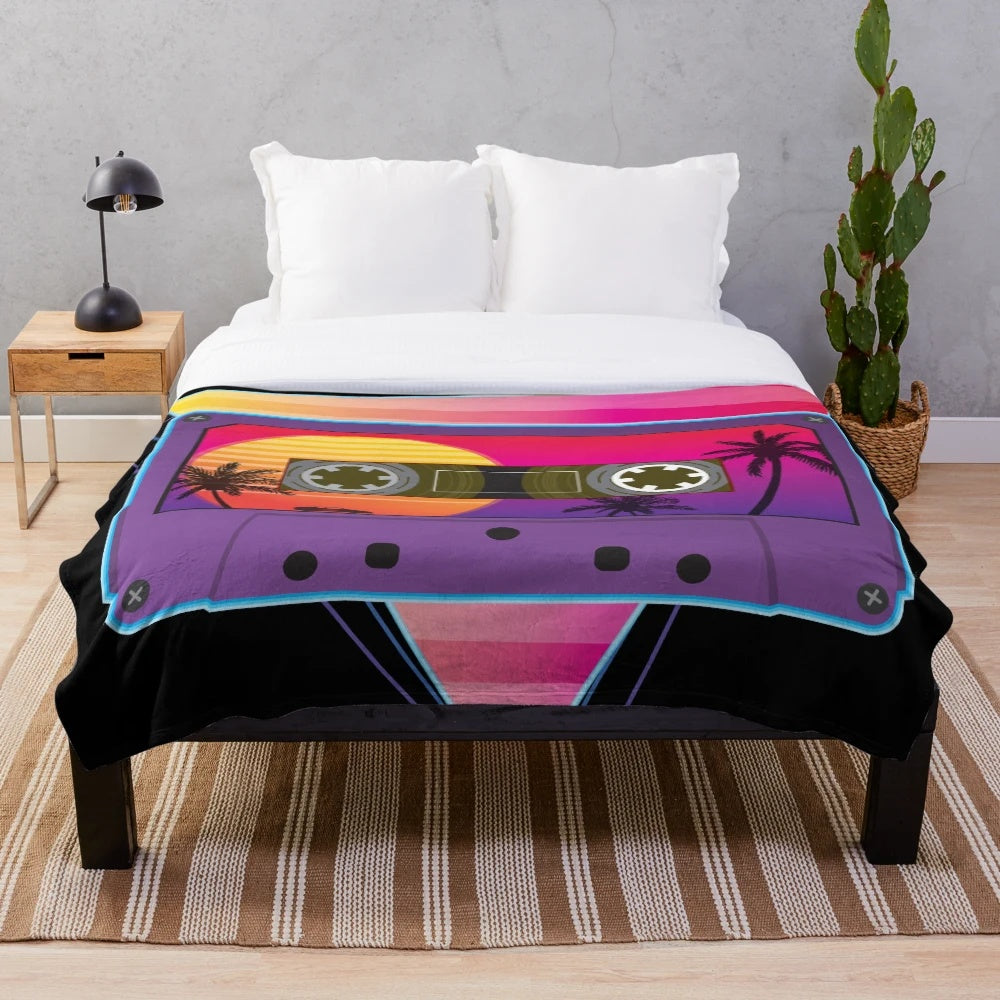 Retro 80s-inspired plush blanket with cassette tape, sunset, palm trees, and sports car design