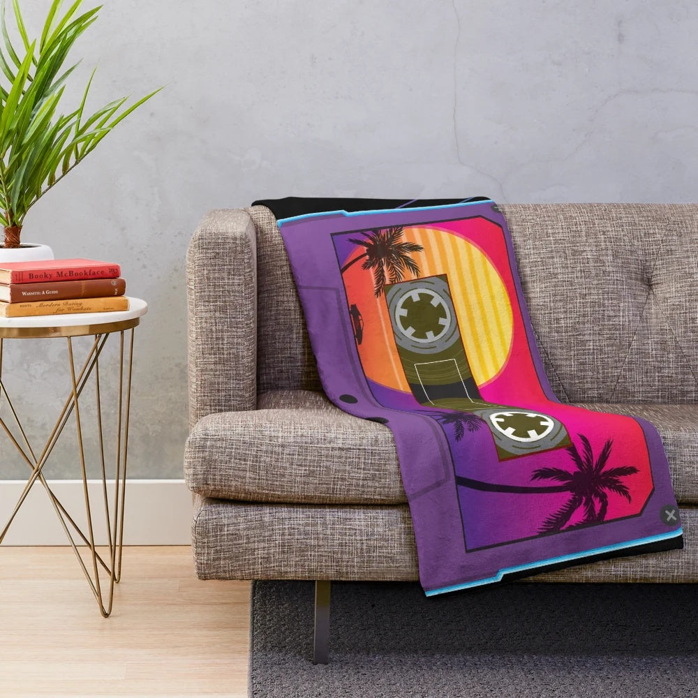 Retro 80s-inspired plush blanket with cassette tape, sunset, palm trees, and sports car design