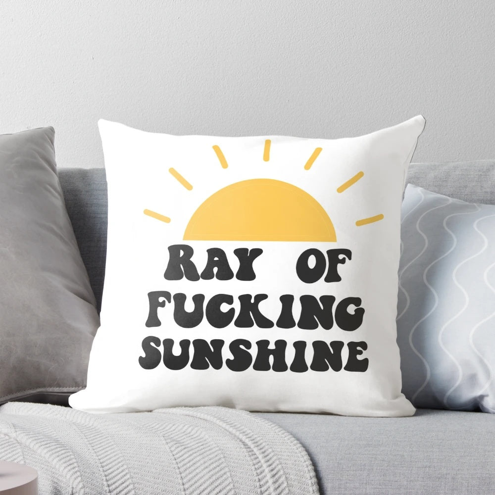 Retro-style 'Ray of Sunshine' pillow with a vibrant sun design