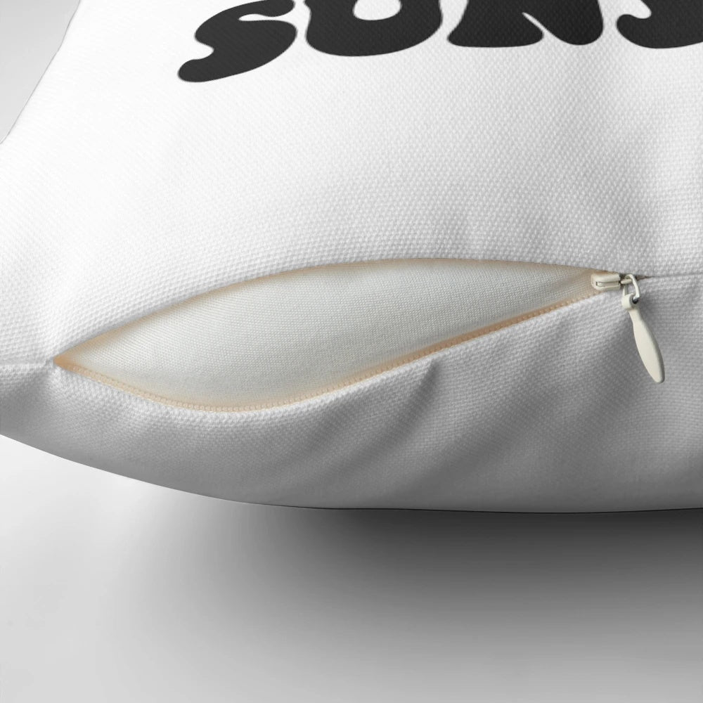 Retro-style 'Ray of Sunshine' pillow with a vibrant sun design