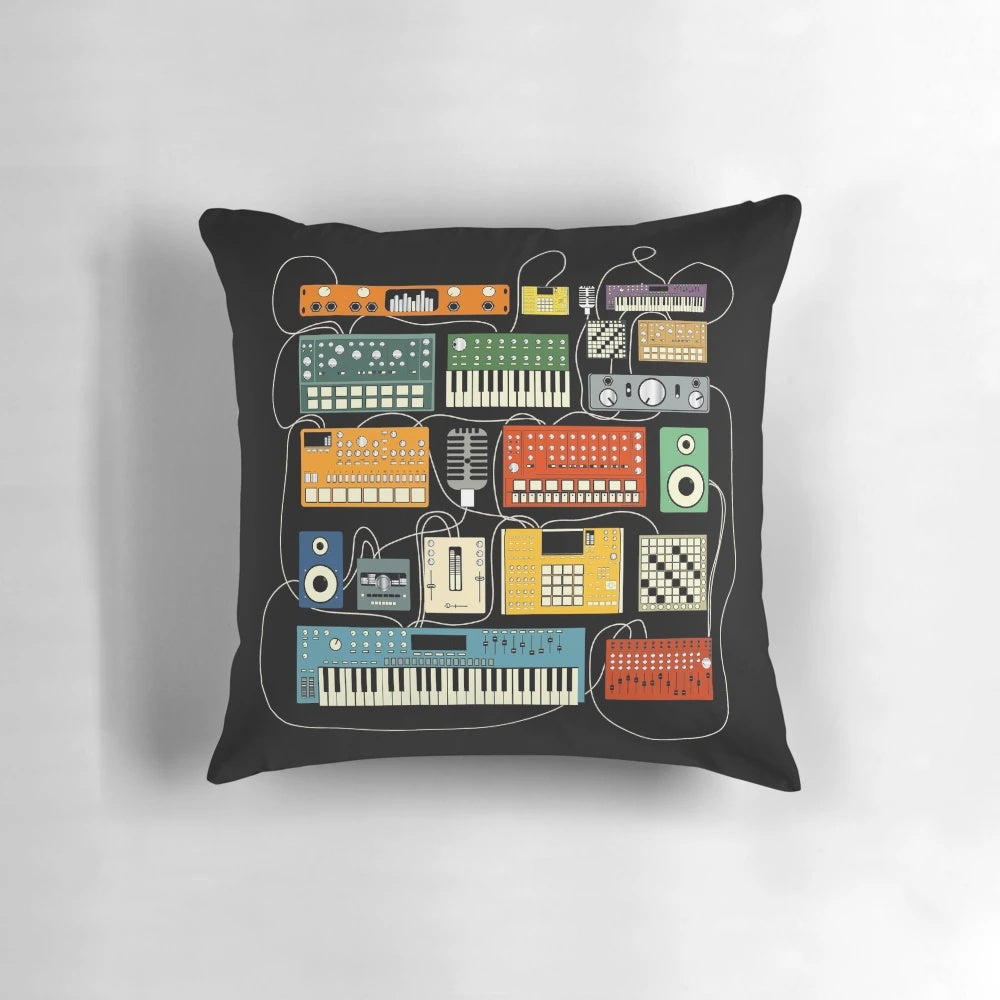 Pillow featuring a retro-style synthesizer and drum machine design for electronic music enthusiasts