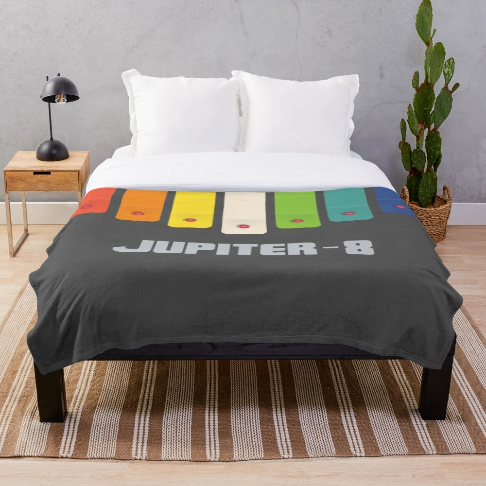 Plush blanket featuring the iconic Roland Jupiter 8 synthesizer design in a rainbow color scheme