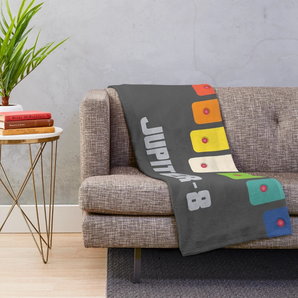 Plush blanket featuring the iconic Roland Jupiter 8 synthesizer design in a rainbow color scheme