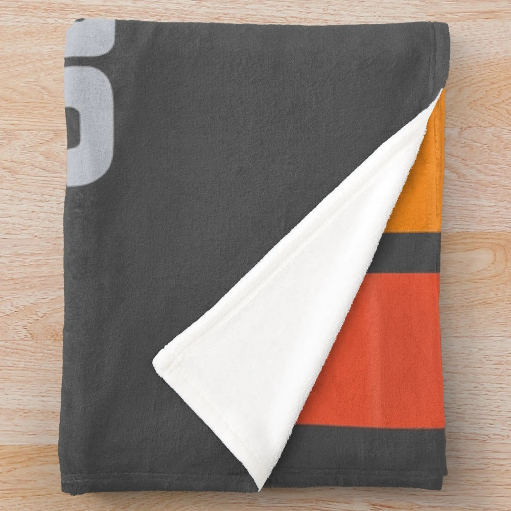 Plush blanket featuring the iconic Roland Jupiter 8 synthesizer design in a rainbow color scheme
