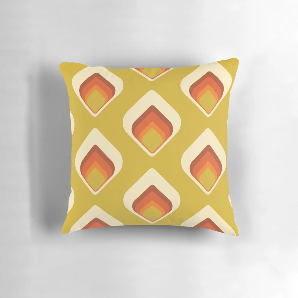 Retro tear drop shaped mid century modern pillow in goldenrod and cream colors
