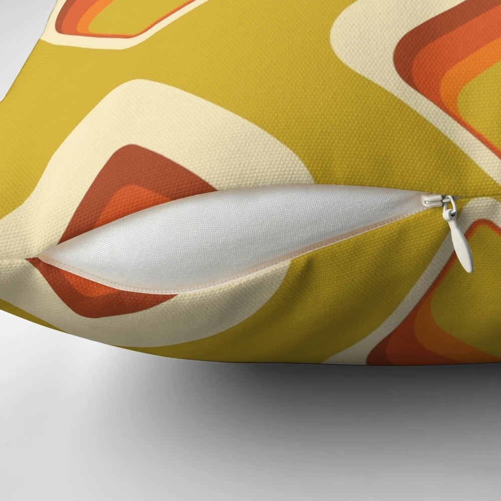 Retro tear drop shaped mid century modern pillow in goldenrod and cream colors