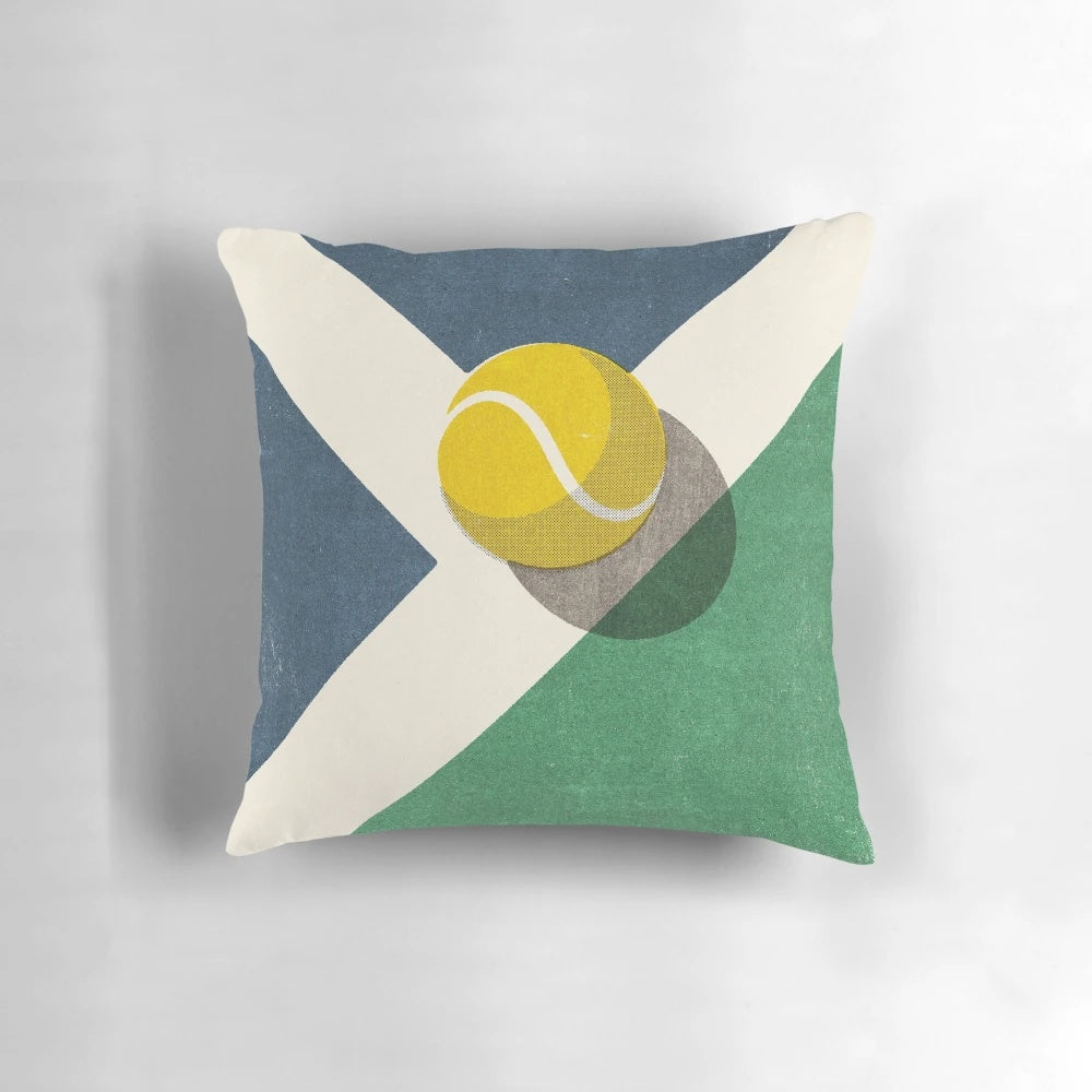 Retro illustration of a tennis ball on a hard court surface, printed on a throw pillow for sports-themed home decor.