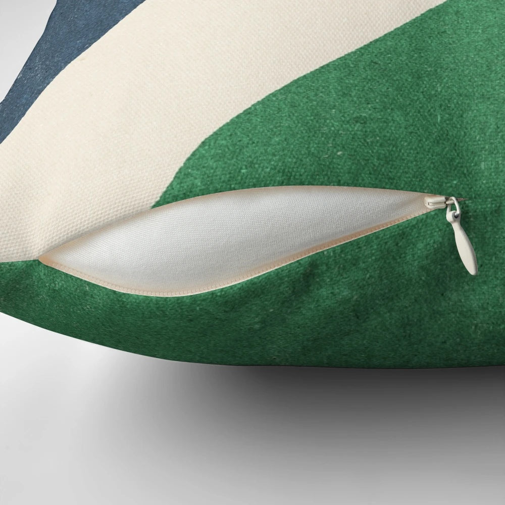 Retro illustration of a tennis ball on a hard court surface, printed on a throw pillow for sports-themed home decor.