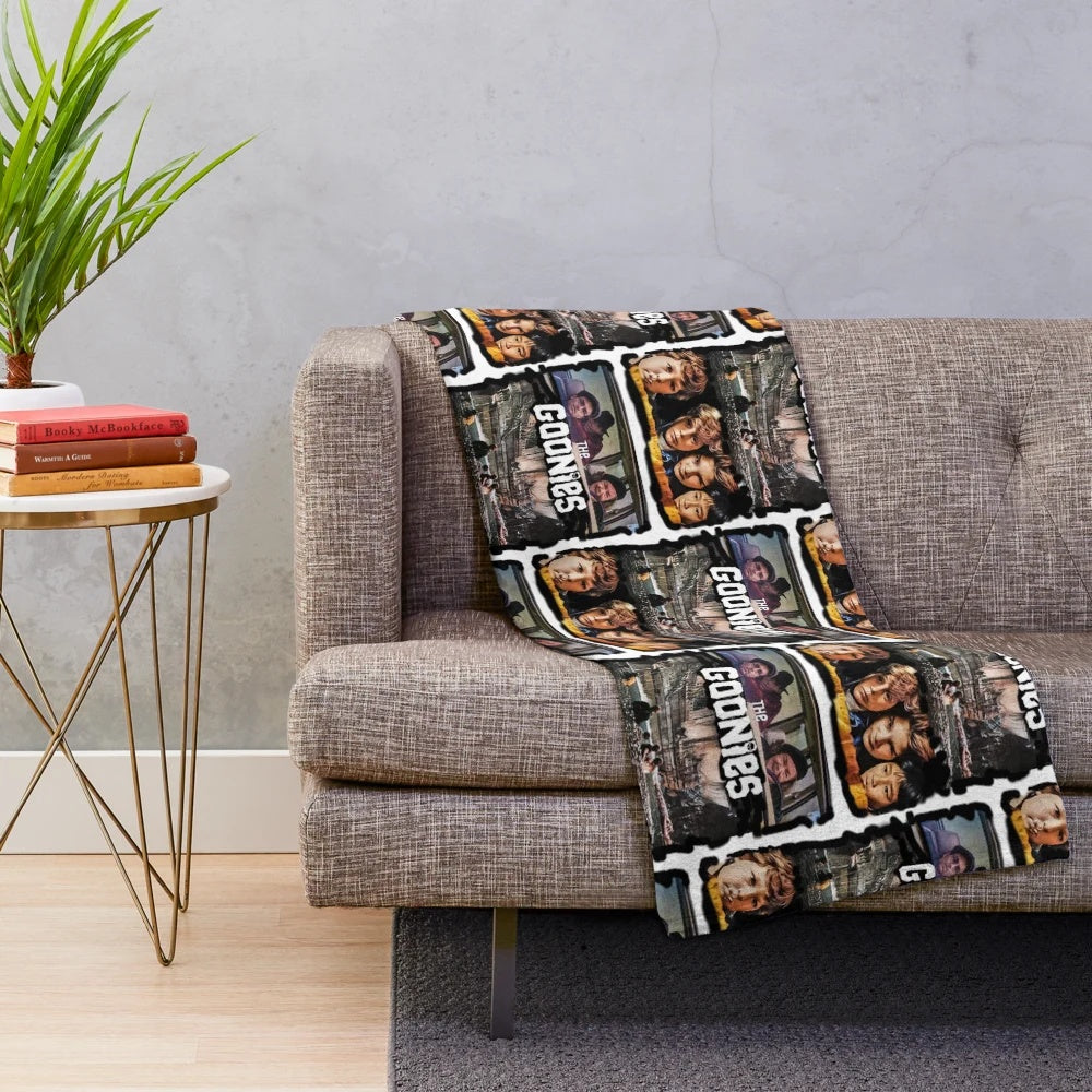The Goonies inspired plush blanket featuring the iconic movie's imagery