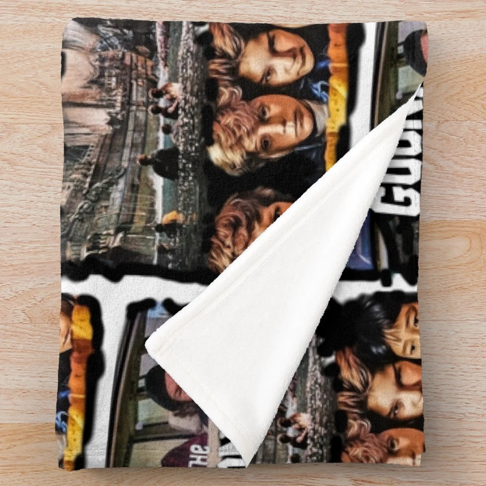 The Goonies inspired plush blanket featuring the iconic movie's imagery