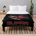 Cozy plush blanket inspired by the iconic Toyota Supra Mk3 sports car