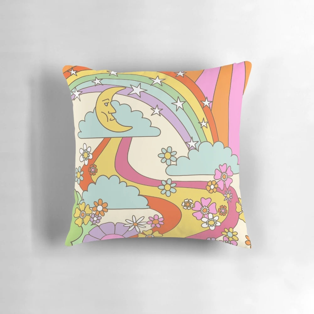 Retro trippy boho hippie print decorative throw pillow with psychedelic moon, sun, and rainbow design.