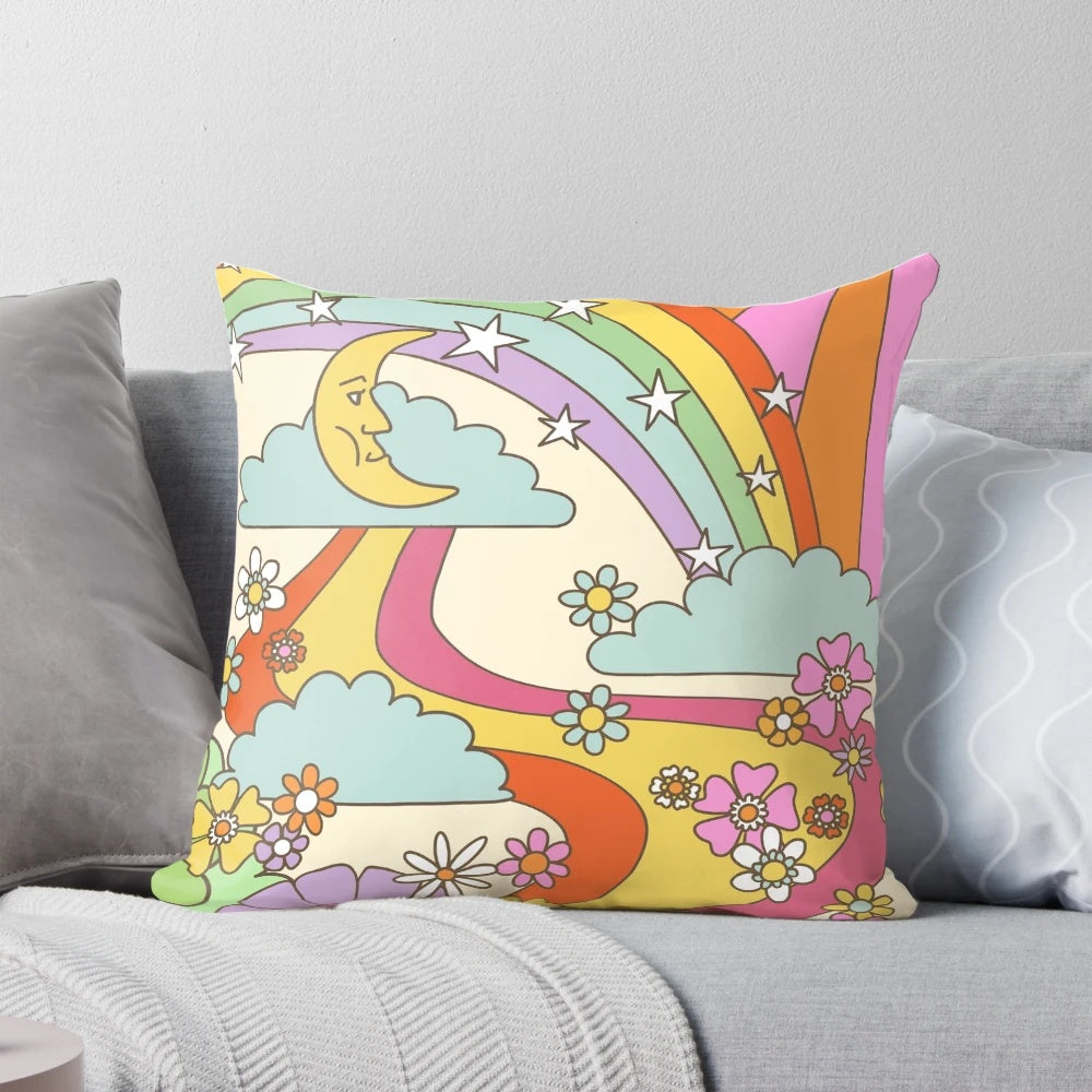 Retro trippy boho hippie print decorative throw pillow with psychedelic moon, sun, and rainbow design.