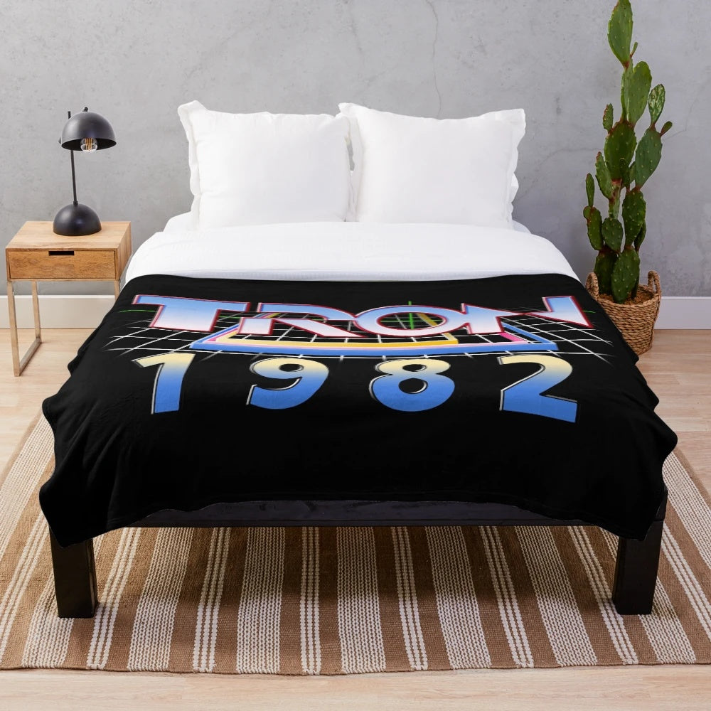 Tron 1982 plush blanket featuring the iconic neon grid design
