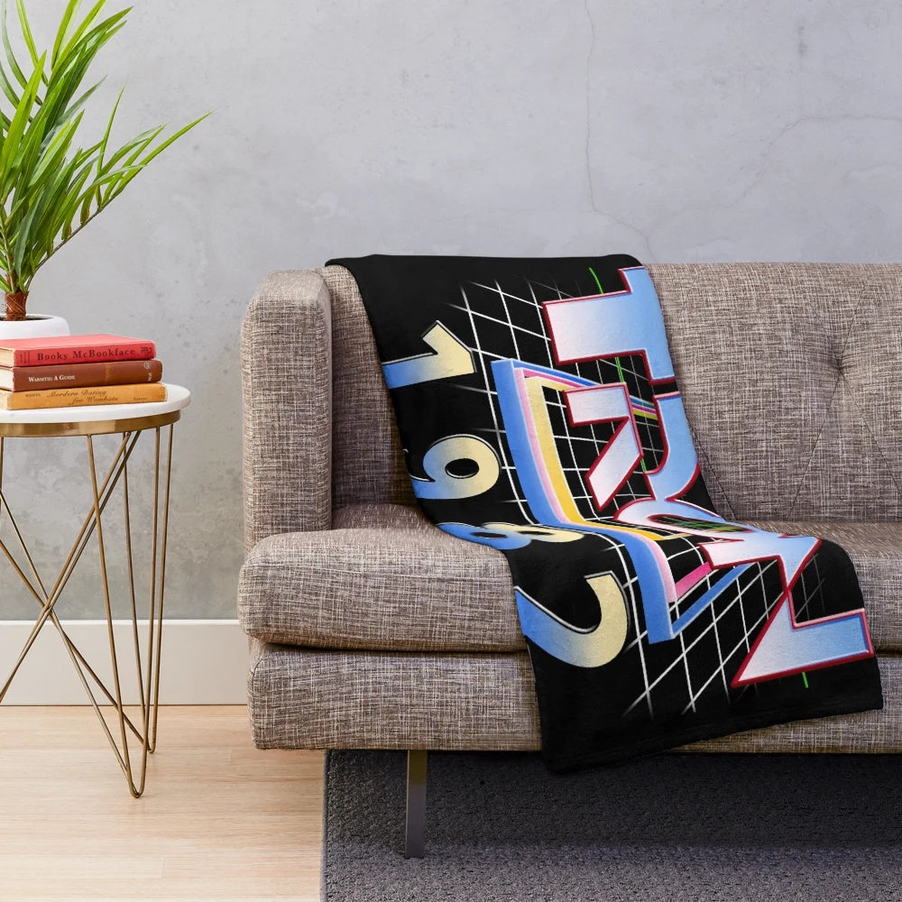 Tron 1982 plush blanket featuring the iconic neon grid design