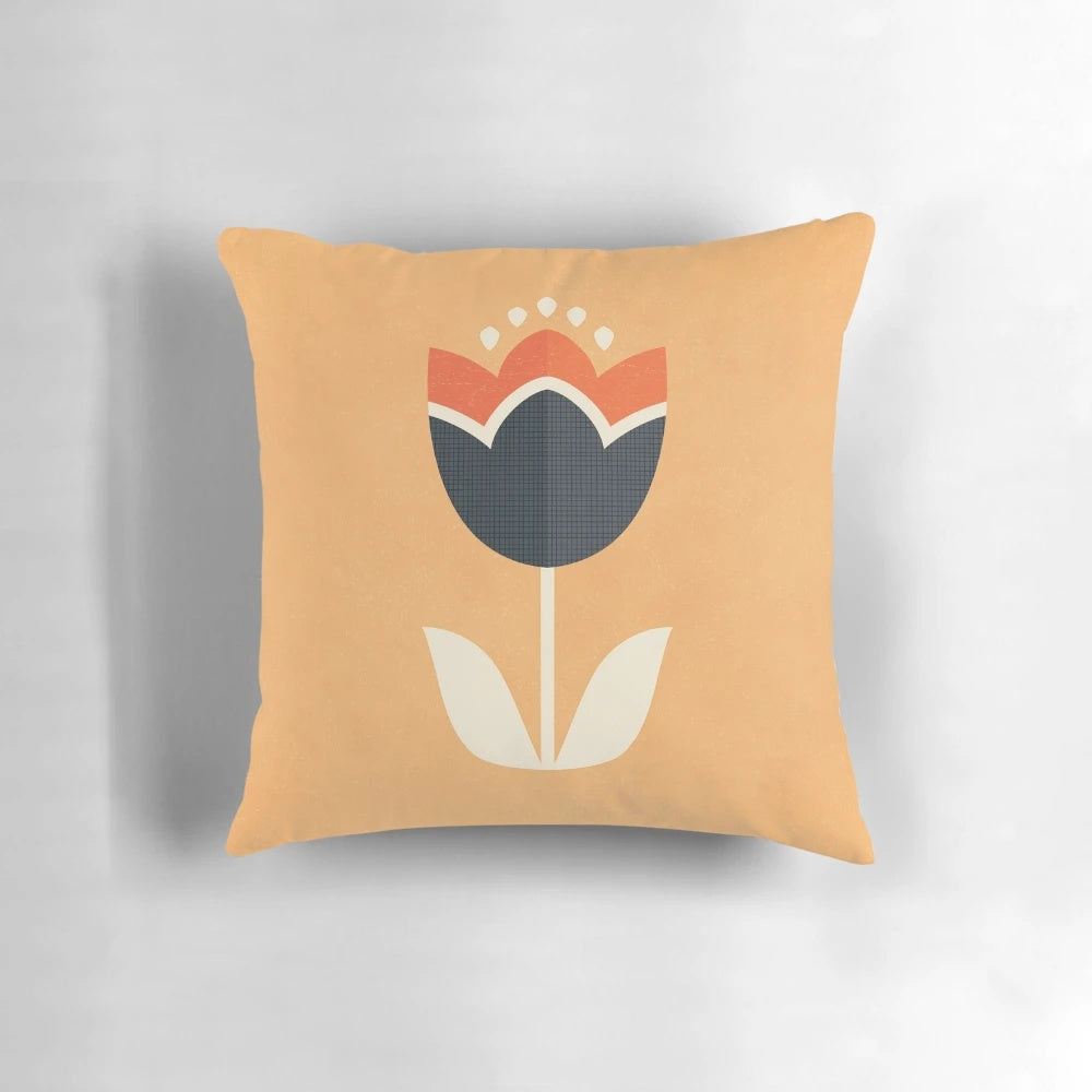Retro tulip patterned throw pillow in orange and cream colors