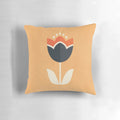 Retro tulip patterned throw pillow in orange and cream colors