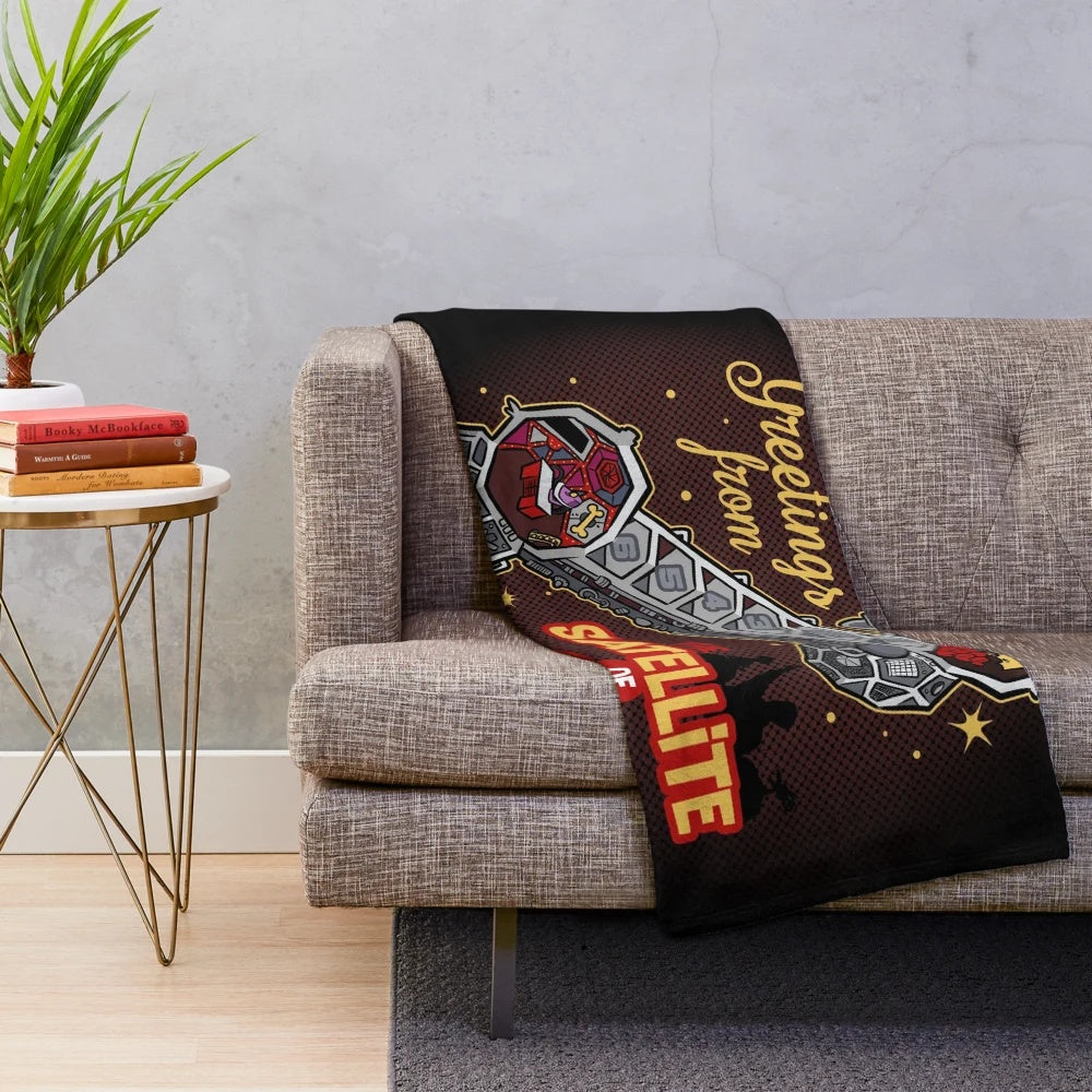 Cozy MST3K-inspired plush blanket featuring the Satellite of Love
