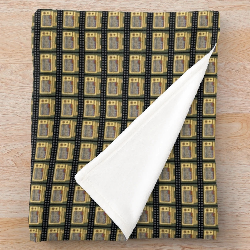 Plush blanket featuring a retro television design with floral and landscape elements