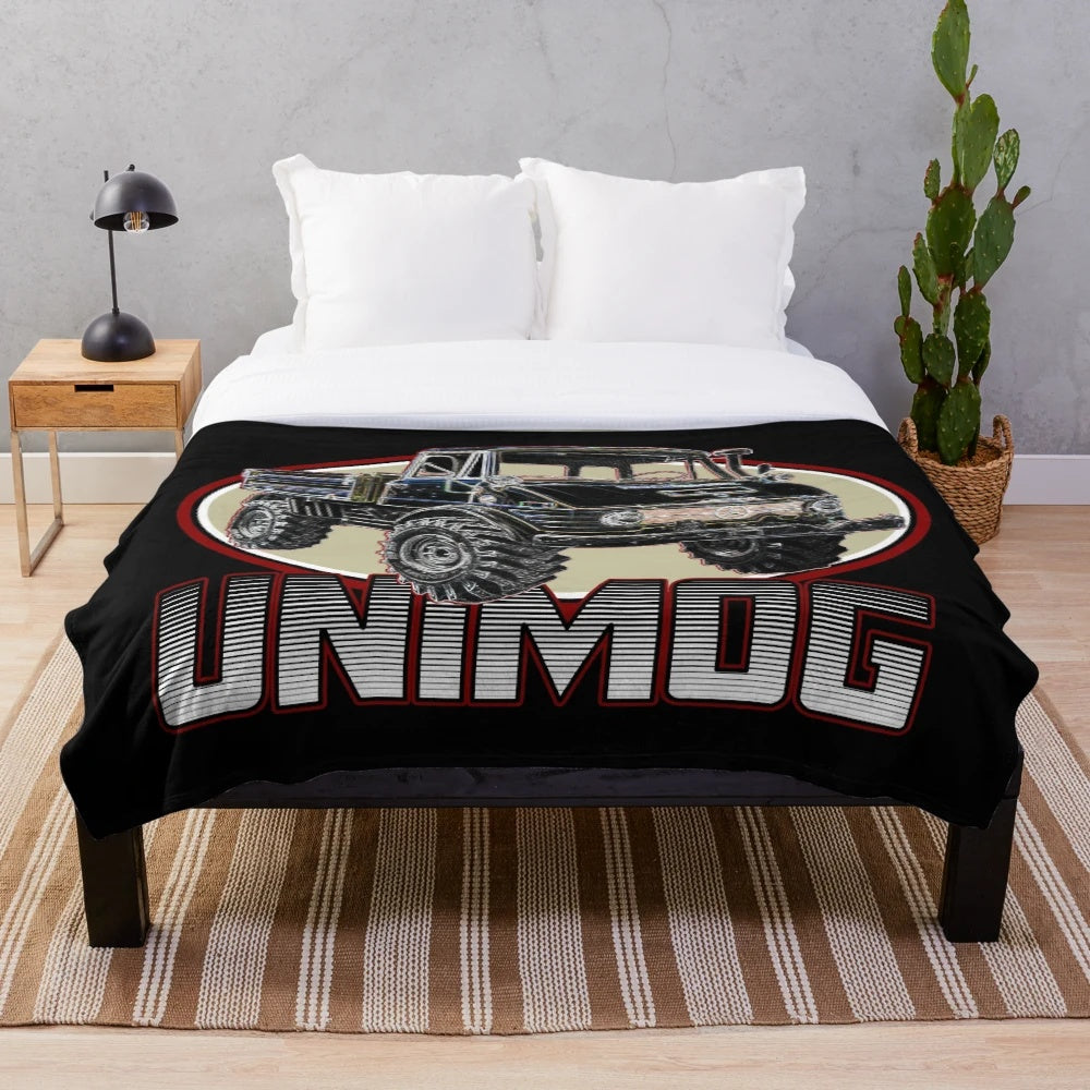Vintage UNIMOG truck plush blanket with a black background