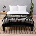 Retro Unimog-inspired plush blanket with a cool, graphic design