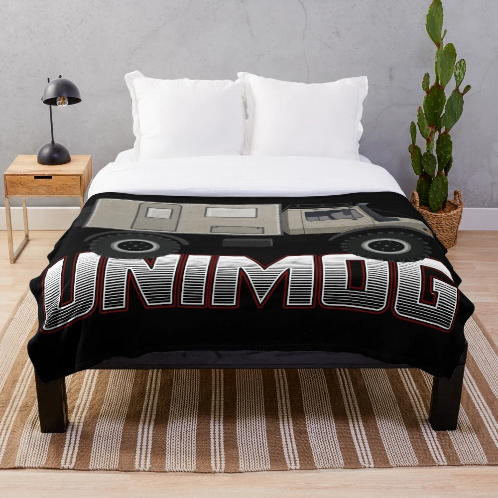 Retro Unimog-inspired plush blanket with a cool, graphic design