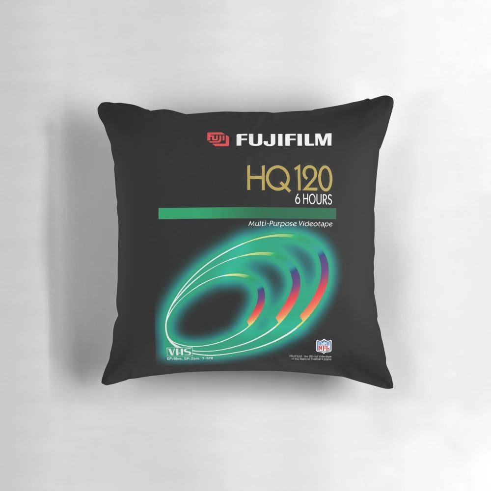 Retro vaporwave aesthetic pillow featuring a vintage VHS tape design