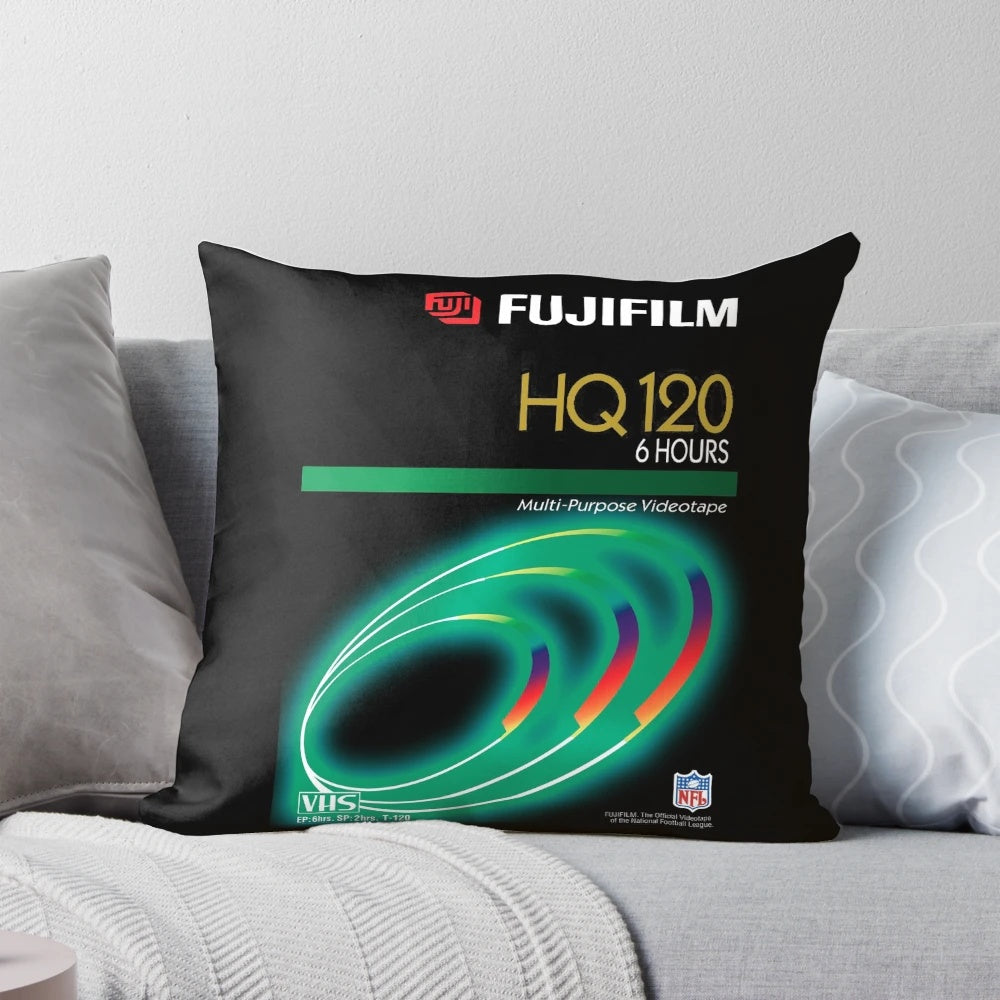 Retro vaporwave aesthetic pillow featuring a vintage VHS tape design