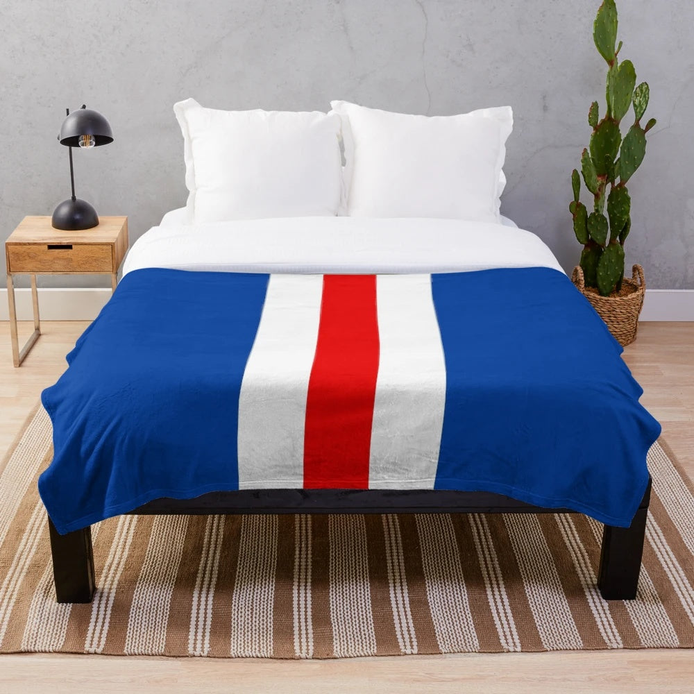 Retro rangers plush blanket with vertical bar stripes in blue, white, and red