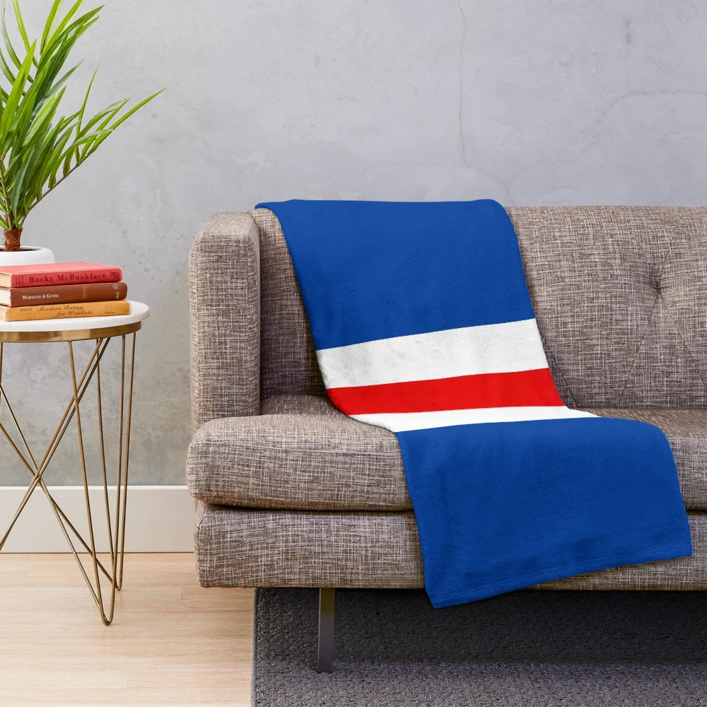 Retro rangers plush blanket with vertical bar stripes in blue, white, and red
