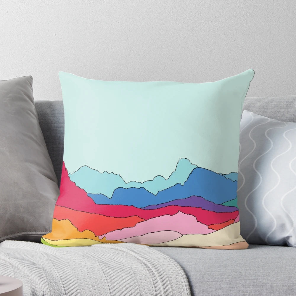Retro-inspired pillow featuring vibrant rainbow mountains design