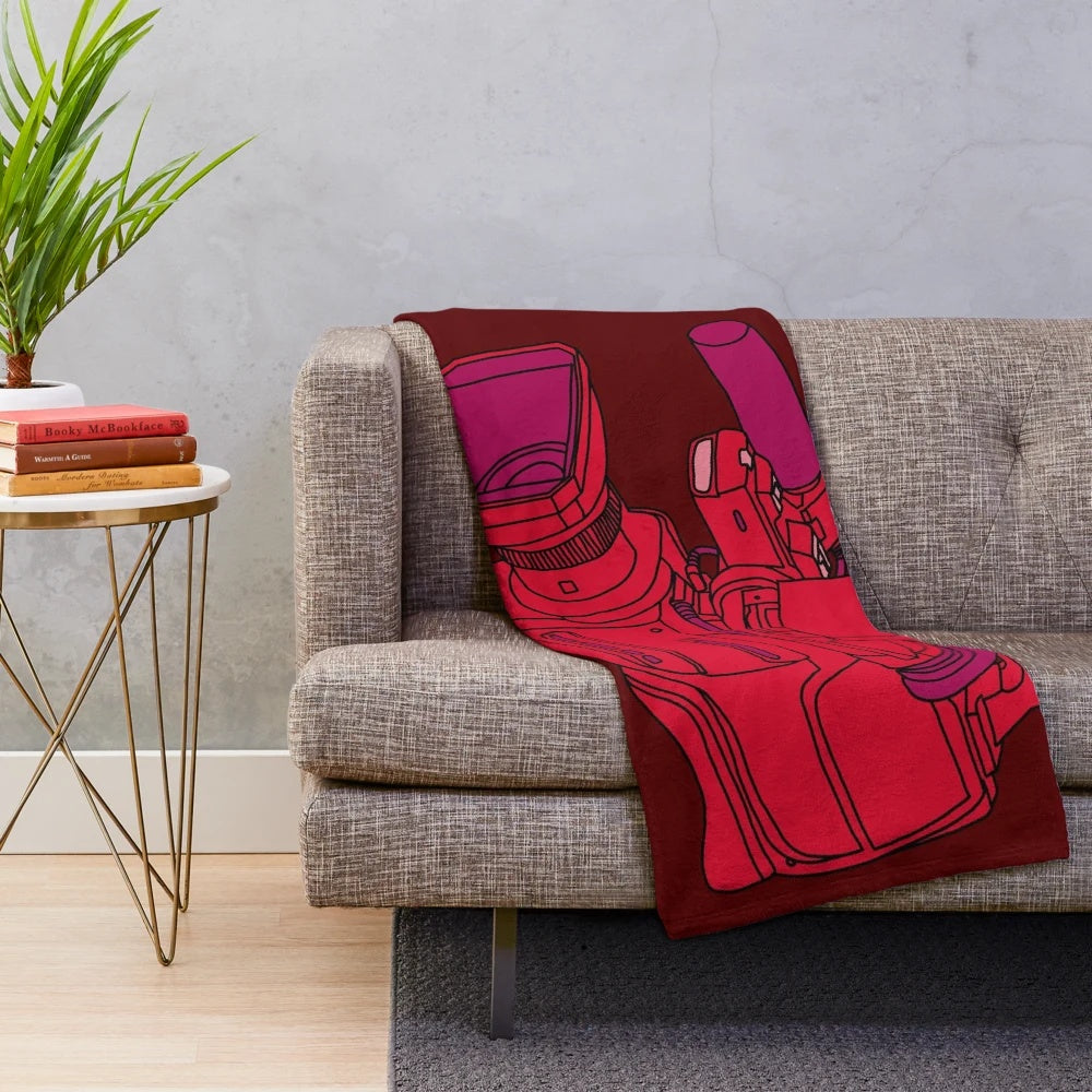Cozy red plush blanket with a retro video camera design