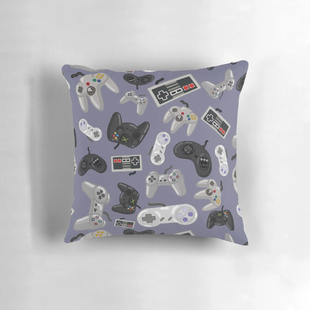 Pillow with a repeating pattern of classic video game controllers from retro gaming consoles