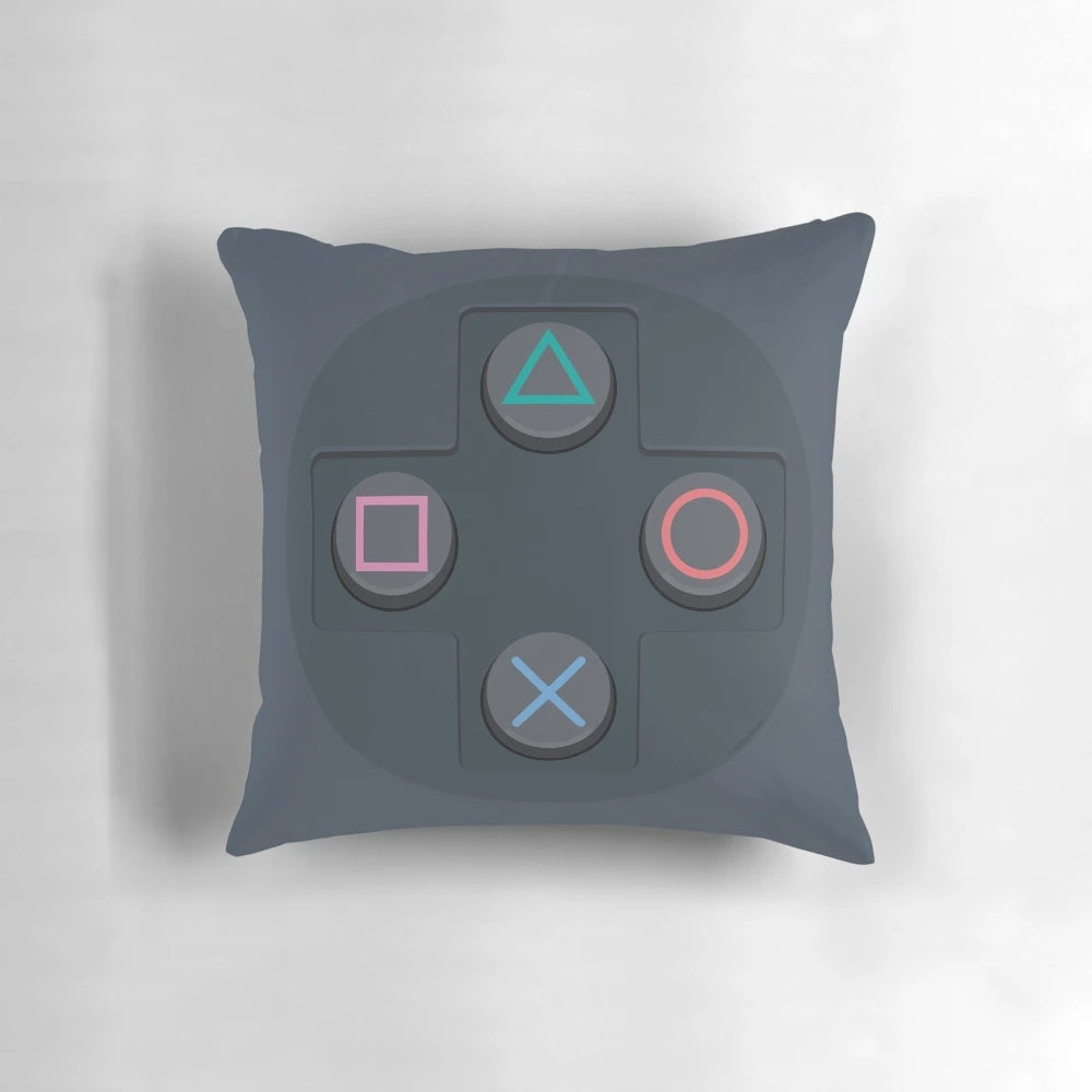 Retro video game controller buttons printed on a soft, plush pillow