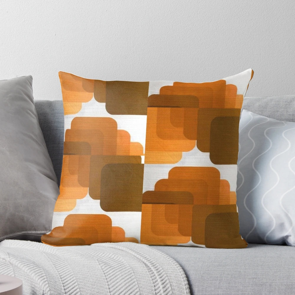 Vintage geometric throw pillow with warm brown and orange colors
