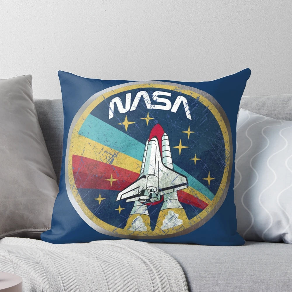 Retro vintage NASA-inspired pillow with a metal border design featuring the NASA logo and space-themed elements.