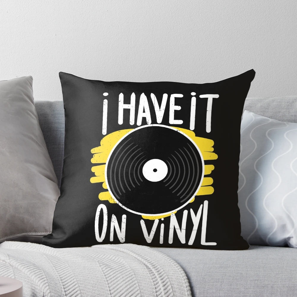 A cozy t-shirt pillow featuring a vintage vinyl record design, perfect for vinyl record collectors and music lovers.