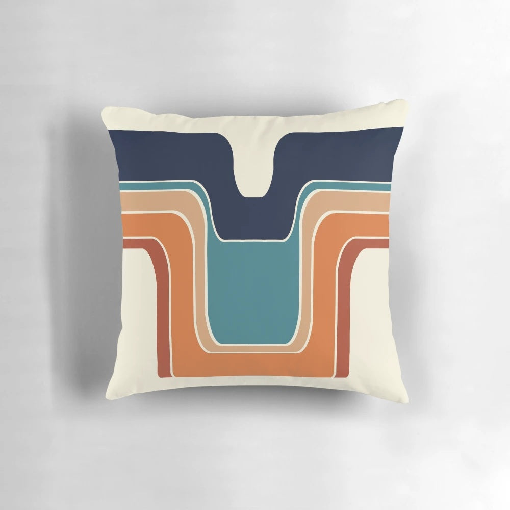 Mod Wave Space Pillow with retro, curved wave design in blue, orange, red, and black on a cream background