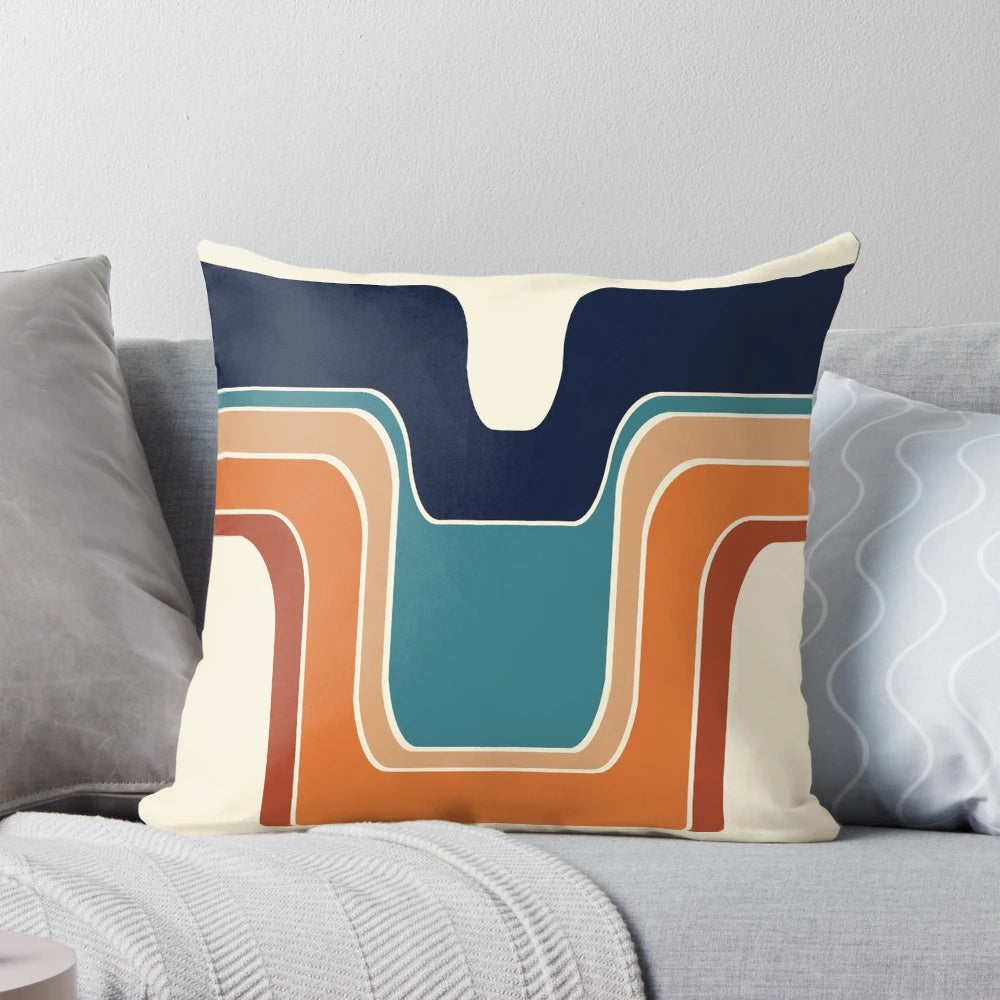 Mod Wave Space Pillow with retro, curved wave design in blue, orange, red, and black on a cream background