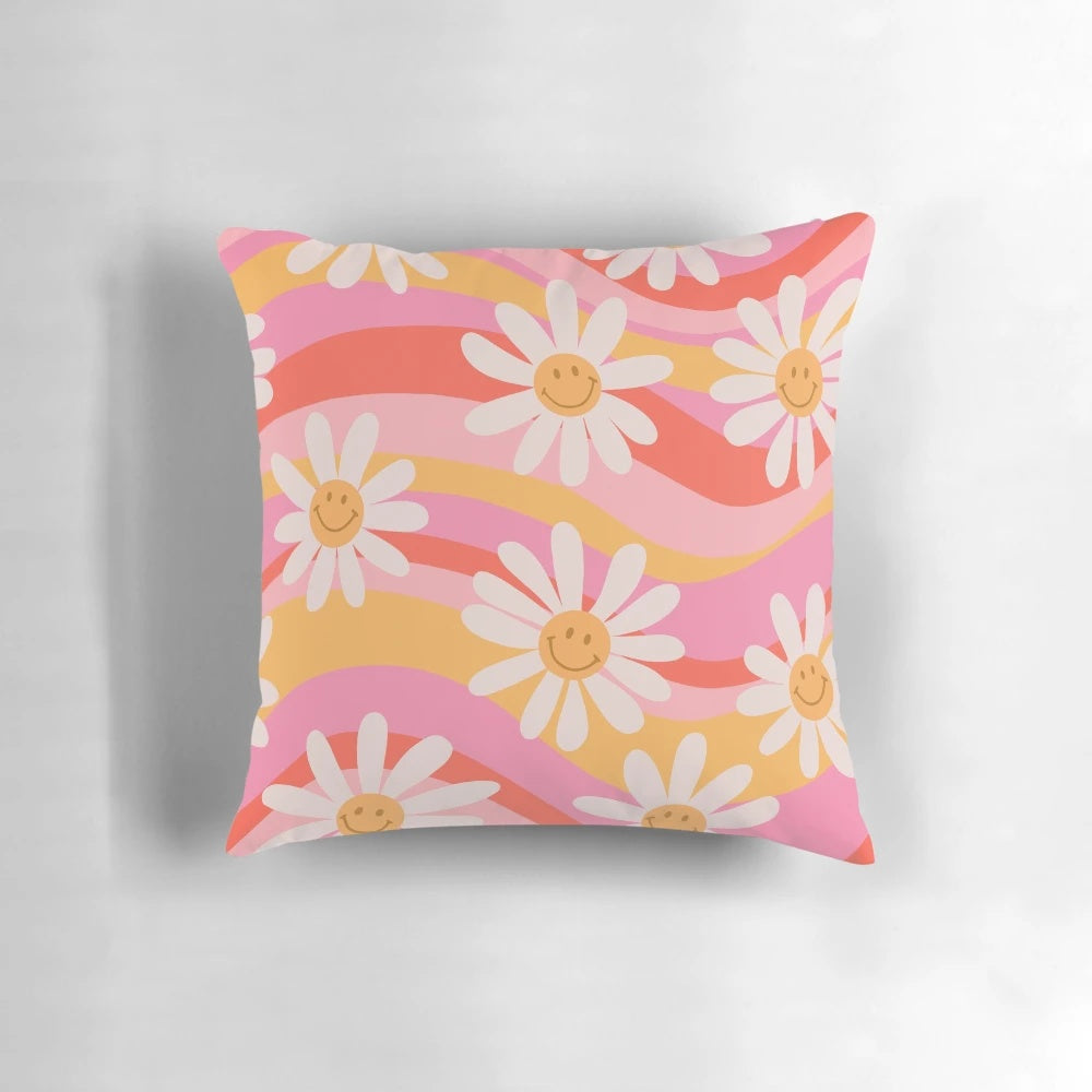 Vibrant retro floral print with wavy daisies and a cheerful, psychedelic design on a throw pillow for modern, bohemian home decor.