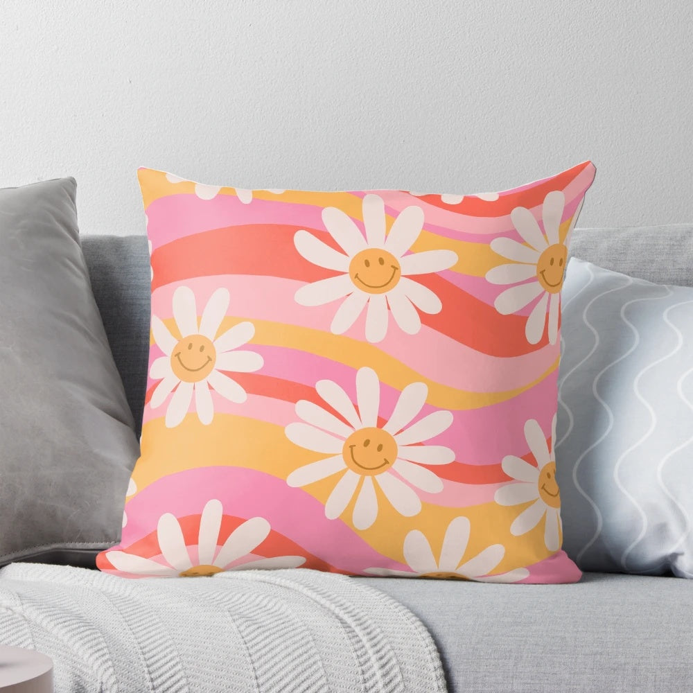 Vibrant retro floral print with wavy daisies and a cheerful, psychedelic design on a throw pillow for modern, bohemian home decor.