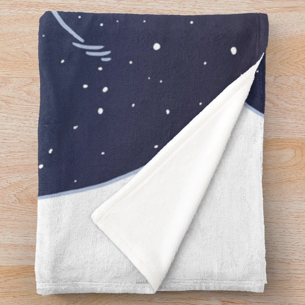 Cozy plush blanket with a day and night design featuring clouds, stars, and a huggable bear