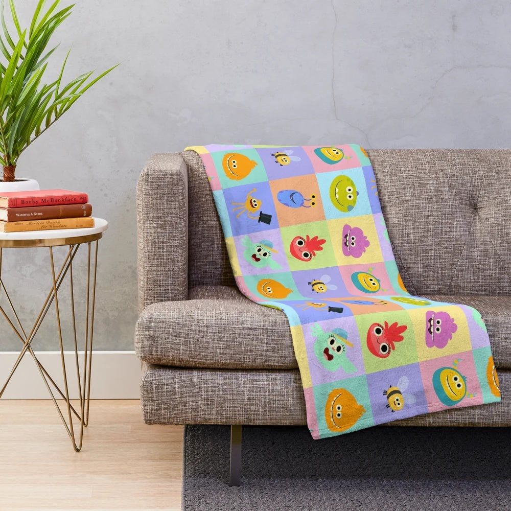Rhymington Square inspired plush blanket with colorful patterns